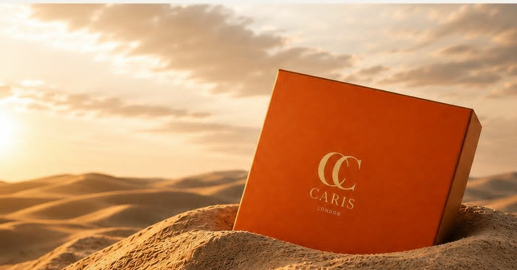 Orange Caris presentation box in a warm desert setting